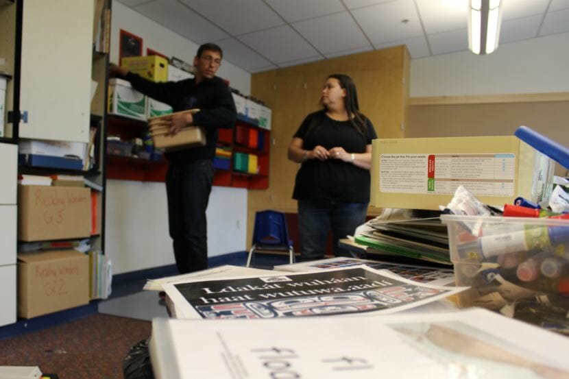Naakil.aan Hans Chester and Seiǥōot Jessica Chester set up a classroom at Harborview Elementary School on Friday, Aug. 17, 2018. (Photo by Adelyn Baxter/KTOO)