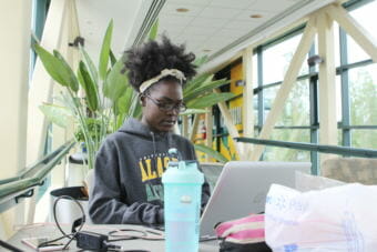 Nyariak Kuany studies for one of her summer final exams at the University of Alaska Anchorage in July 2018. Kuany receives both the Alaska Education Grant and the Alaska Performance Scholarship.