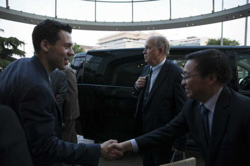 Staff from Alaska Gov. Bill Walker's office greet employees of the Bank of China during a trade mission stop at the bank's headquarters on May 25, 2018, in Beijing, China. (Photo by Rashah McChesney/Alaska's Energy Desk)