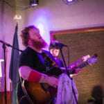Guitarist and songwriter Patrick Troll headlines the 2018 KXLL Showcase with the Amish Robots during the Alaska Folk Festival. (Photo by Annie Bartholomew/KTOO)