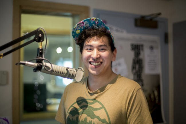 Actor and AWARE Equity Coordinator Austin Tagaban performs the anonymously submitted monologue "Consent" as part of the production Same. (Photo by Annie Bartholomew/KTOO)