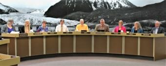 The new Juneau Assembly at its first meeting on Oct. 15, 2018. From left: Mayor Beth Weldon, Maria Gladziszewski, Mary Becker, Jesse Kiehl, Loren Jones, Rob Edwardson, Carole Triem, Michelle Bonnet Hale and Wade Bryson. (Photo by Adelyn Baxter/KTOO)