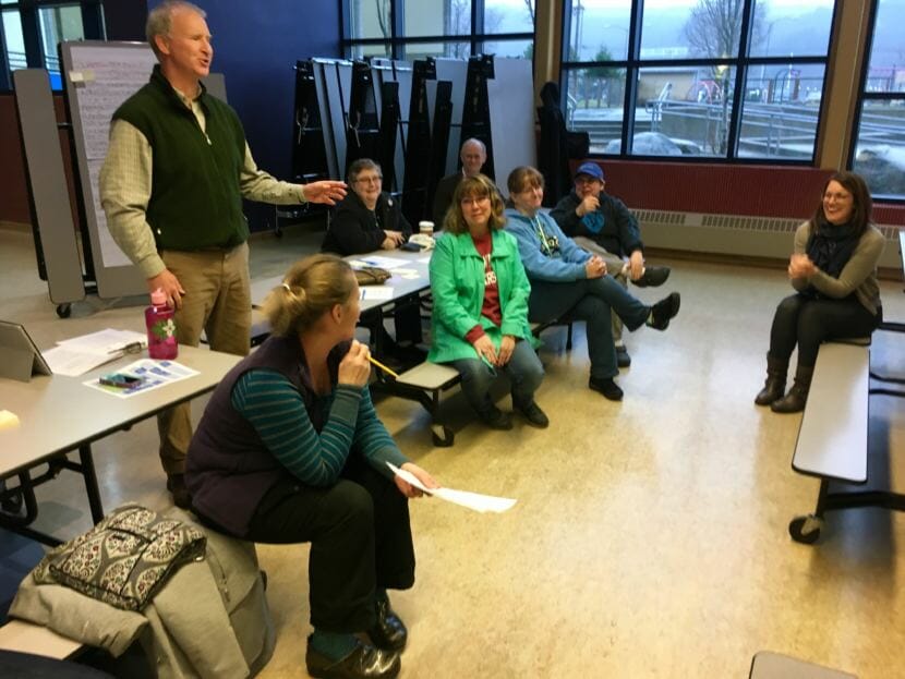 School Board president Brian Holst [left] gathers public input at a meeting on the selection of a new superintendent to head the Juneau School District. Photo: Zoe Grueskin/KTOO.