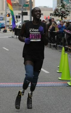 Marko Cheseto competes in the Skinny Raven Half Marathon at the Anchorage RunFest in August 2018.