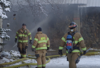 Anchorage Fire Department firefighters respond to a call after an earthquake rocked Anchorage on Nov. 30, 2018. (Video still by Joey Mendolia/Alaska Public Media)