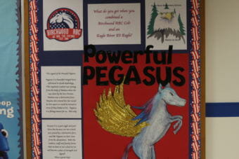 The billboard at Birchwood ABC Elementary, highlighting the mascots — and new combined mascot — of the students attending.