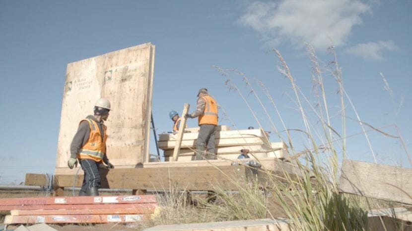 Local workers in Eek construct a 320-square-foot tiny home as part of a CVRF pilot project to see if tiny homes funded partly by mortgages could increase homeownership in communities with housing shortages.