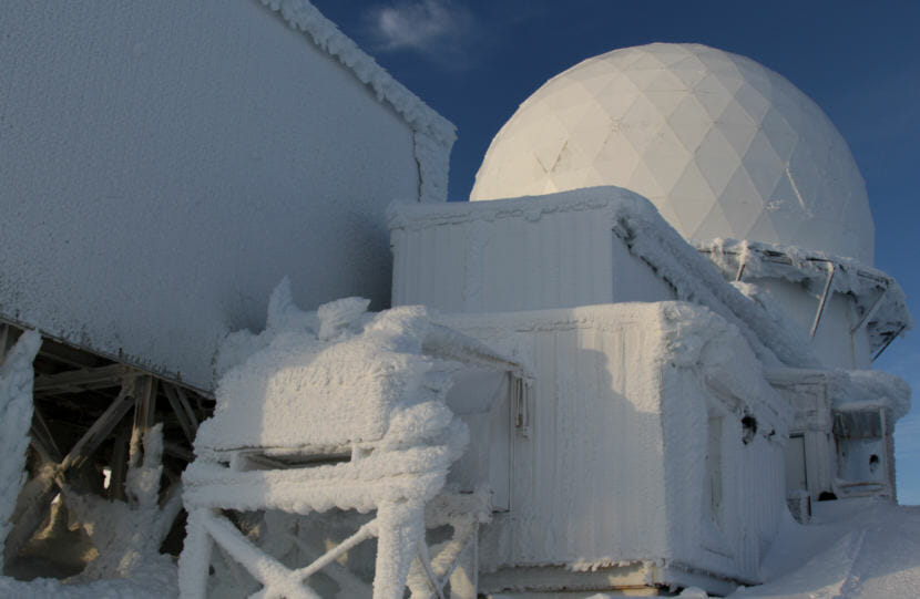 Even in mid-November during a relatively mild early winter, ice still clings to the structures housing the long range radar at Tin City.