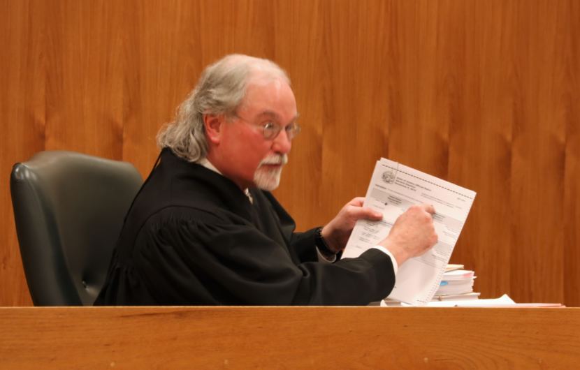 Alaska Supreme Court Justice Craig Stowers asks a question about language on an election ballot during oral argument in an election recount case in Anchorage on Jan. 4, 2019.