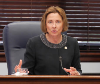 Sen. Cathy Giessel, R-Anchorage, talks with journalists at a Senate Majority press availability in Juneau on Jan. 15, 2019.