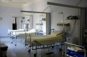 A row of beds in a hospital.