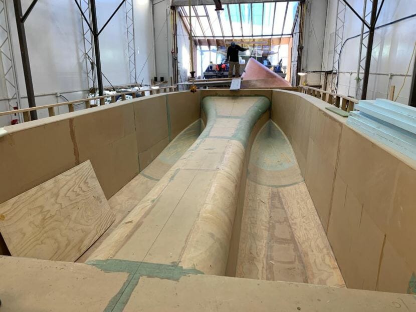 The mold of a 37-foot catamaran sits in Eric Sloth's boat shop in Homer.