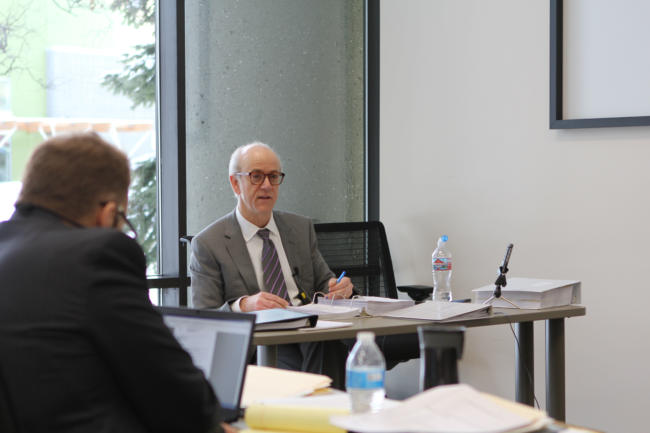 Hollis French responds to questions at a public hearing on Feb. 8, 2019.