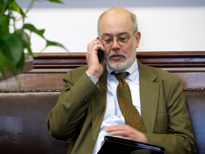Joe Geldhof talks on the phone in the second floor hallway of the Capitol in Juneau on Feb. 15, 2019.