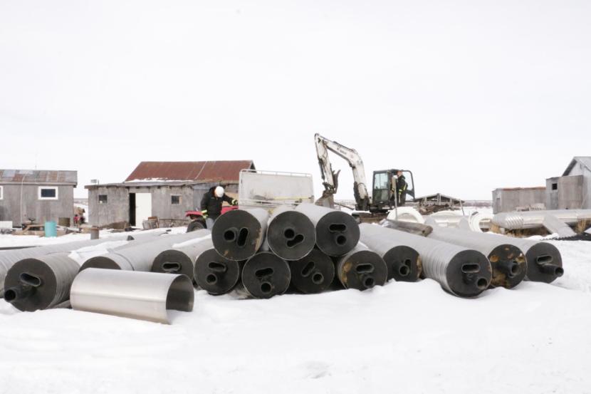 ANTHC crews prepare to bury water lines in Eek on February 20, 2019. (Photo by Anna Rose MacArthur/KYUK)