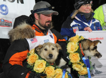 Iditarod 2019 champion Pete Kaiser and his dogs Marrow and Lucy at the end of the 1,000-mile race in Nome.