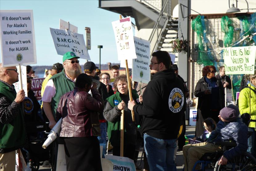 Hundreds of people rallied in downtown Anchorage on March 26, 2019, in protest of Gov. Mike Dunleavy’s budget proposal.