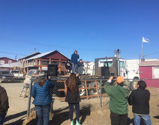 Sen. Lisa Murkowski speaks to a crowd of people at Bethel’s annual river breakup bash.
