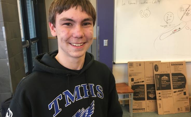 Teilhard Buzzell at a robotics practice at Thunder Mountain High School on April 9, 2019. Buzzell says he likes sharing ideas and inspiration with robotics teams from around the country, and he's excited to meet some of those teams in person at the world championship. (Photo by Zoe Grueskin/KTOO)