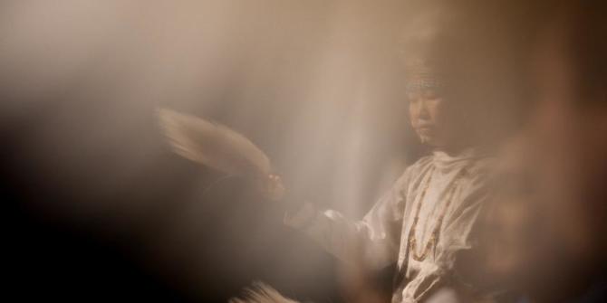 Cungak Simone Tununchuk dances during the Cama-i dance festival on Sunday, March 31, 2019 in Bethel, Alaska. (Photo by Rashah McChesney / KYUK/Alaska's Energy Desk)