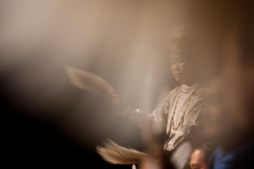 Cungak Simone Tununchuk dances during the Cama-i dance festival on Sunday, March 31, 2019 in Bethel, Alaska. (Photo by Rashah McChesney / KYUK/Alaska's Energy Desk)