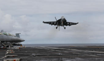 An F-18 Super Hornet lands on the USS Theodore Roosevelt in the Gulf of Alaska during Northern Edge 2019 training exercises.