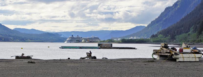 Nathan Brooks tidies up his gold dredging gear at the beach near Sheep Creek on May 15, 2019. He and other recreational gold dredgers leave their gear out there on makeshift rafts.