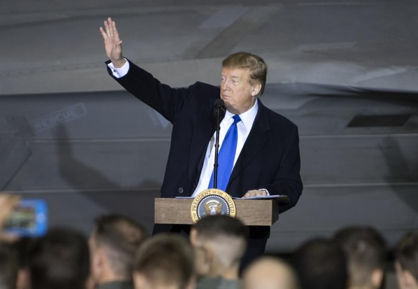 Former President Donald Trump speaks to service members at Joint Base Elmendorf-Richardson, Alaska, Feb. 28, 2019. The President was at the base to meet with service members after returning from a summit in Hanoi, Vietnam.