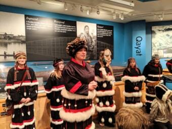 Candace Branson introduces the next song she and and her fellow Alutiiq dancers will perform.