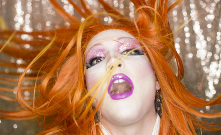 Juneau artist Richard Jay Carter poses backstage that the 5th Annual GLITZ Drag Show at Centennial Hall on Friday, June 14. (Photo by Annie Bartholomew/KTOO)