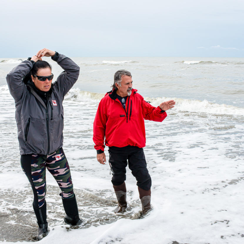 Freya Hoffmeister with kayaking partner Ross Elder, looking out at the Bering Sea.