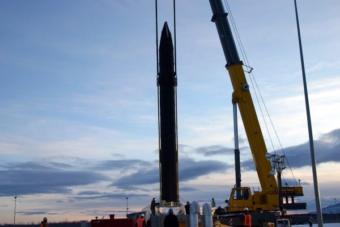 One of the 40 interceptor missiles at Fort Greely is lowered into its silo. An expansion project at the missile-defense base eventually will increase the number of interceptors at Greely to 60. Four more interceptors are based at Vandenberg Air Force Base, Calif. (Photo courtesy of Missile Defense Agency)