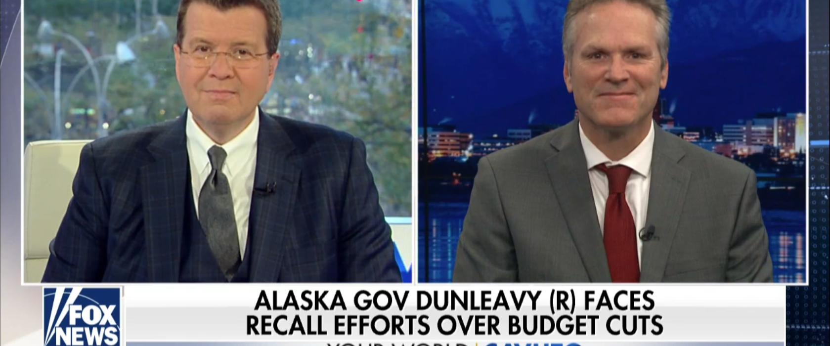 Alaska Gov. Mike Dunleavy, left, appears on Fox News with host Neil Cavuto.