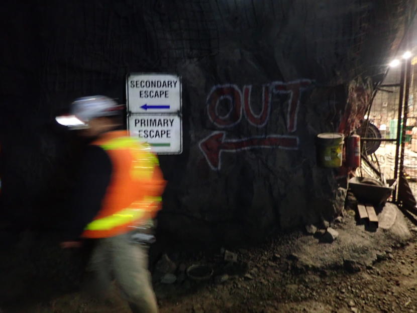 A manager walks past Kensington Gold Mine’s Elmira deposit on Oct. 15, 2019.