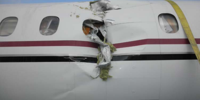 A preliminary National Transportation Safety Board investigation into a fatal PenAir crash in Dutch Harbor on Oct. 17, 2019, includes this photo of damage to the left side of the plane.