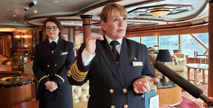 Capt. Inger Thorhauge answers reporters' questions from the Commodore Club aboard Cunard's Queen Elizabeth while it's in port in Juneau on May 18, 2019. It was the cruise ship's first visit to Juneau, though Thorhauge said she'd come to Alaska earlier in her career on much smaller ships.