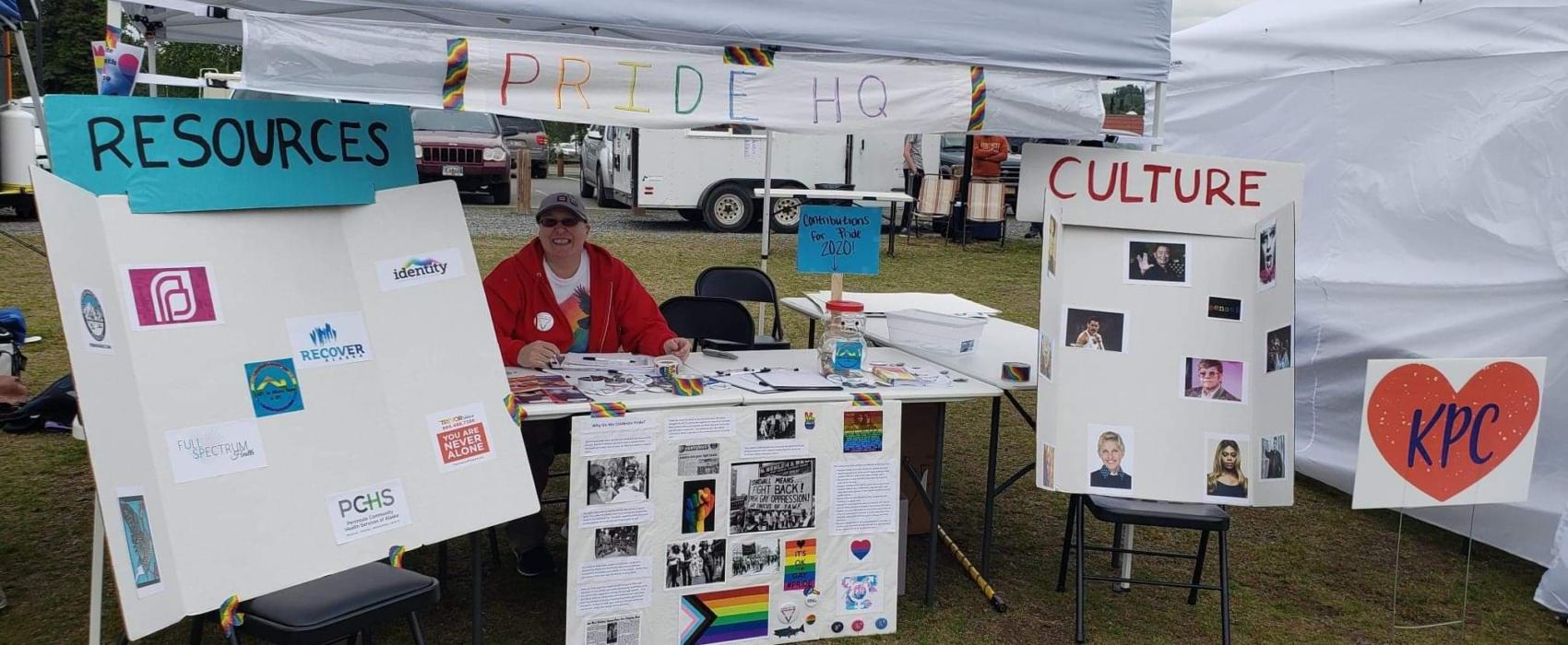 Tammie Willis staffing a Pride table during Pride in the Park in 2019 in Soldotna, Alaska. (Photo courtesy Tammie Willis)