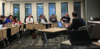 Alaska Permanent Fund Corporation trustees and executives discuss the future of the fund's earnings reserve account at a board meeting on Feb. 20 at the corporation's headquarters in Juneau. Seated, from left: chief executive Angela Rodell; trustees Corri Feige, Mary Rutherford, Craig Richards and William Moran; investment adviser Timothy Walsh; and Chief Investment Officer Marcus Frampton. Photo by Andrew Kitchenman/KTOO and Alaska Public Media