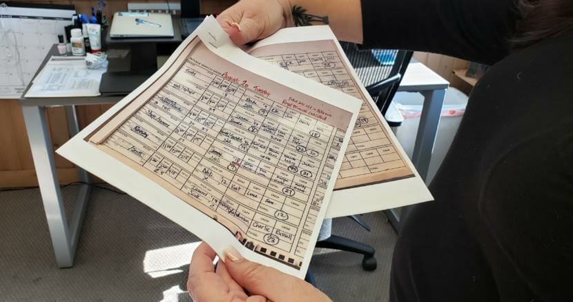 Juneau Tours and Whale Watch General Manager Serene Hutchinson shows what the scheduling board looks like on a regular cruise ship day from the business's dispatch office on March 13, 2020.