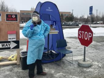 Trish Siza was the first health care provider to greet people in Anchorage seeking COVID-19 testing earlier this month at a drive-thru testing location. (Photo by Casey Grove/Alaska Public Media)
