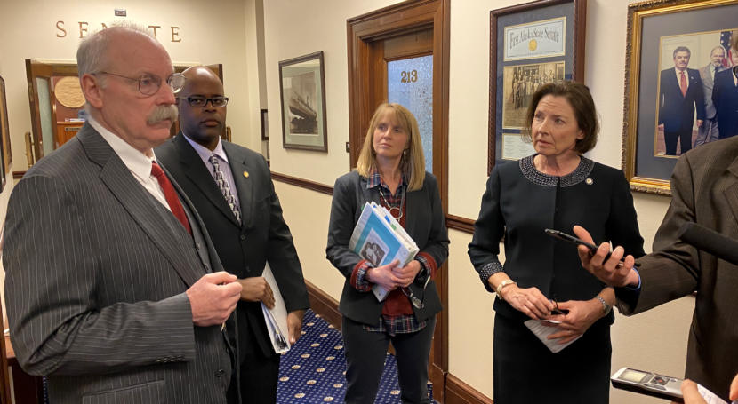 Members of Alaska Senate Majority hold a press conference about funding for COVID-19 preparedness outside Senate Chambers in Juneau on March 11, 2020.