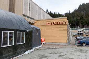 A triage tent is set up to screen patients for symptoms of COVID-19 outside on Monday, April 7, 2020 at Bartlett Hospital in Juneau, Alaska. (Photo by Rashah McChesney/KTOO)