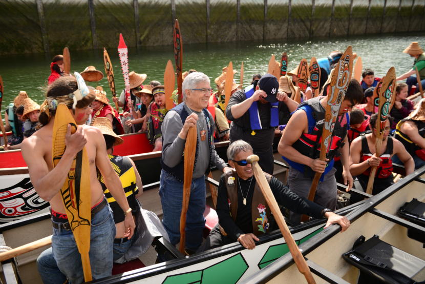 Then-Lt. Gov. Byron Mallott participates in the canoe landing ceremonies that unofficially kick off Celebration in Juneau on June 5, 2018.