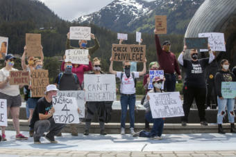 About 250 people gathered for a public “I Can’t Breathe” rally protesting the death of a black man, George Floyd, who was killed after a white officer pressed a knee into his neck while taking him into custody in Minnesota. People held signs decrying violence against black people and calling out institutional racism, many supporting the Black Lives Matter movement on Saturday, May 30, 2020 in Juneau, Alaska. Similar protests happened throughout the state with hundreds turning out in Fairbanks and Anchorage, they’ve also erupted in dozens of cities all over the country. (Photo by Rashah McChesney/KTOO)