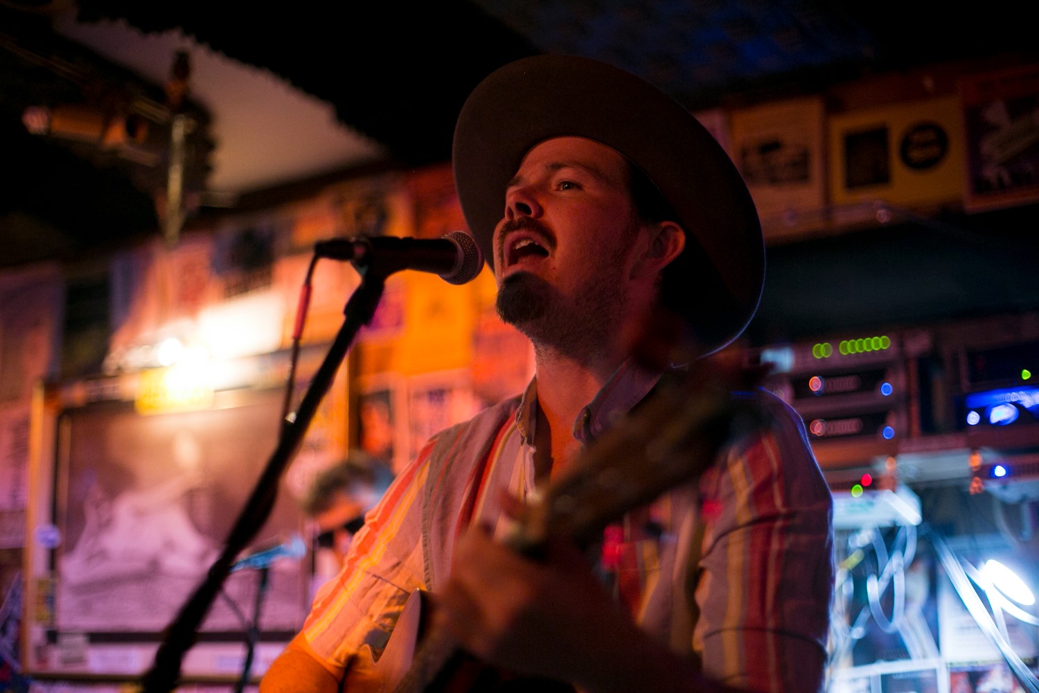Tyson Davis plays with the band Blackwater Railroad Company, in July of 2019 in Juneau. (File photo KTOO)