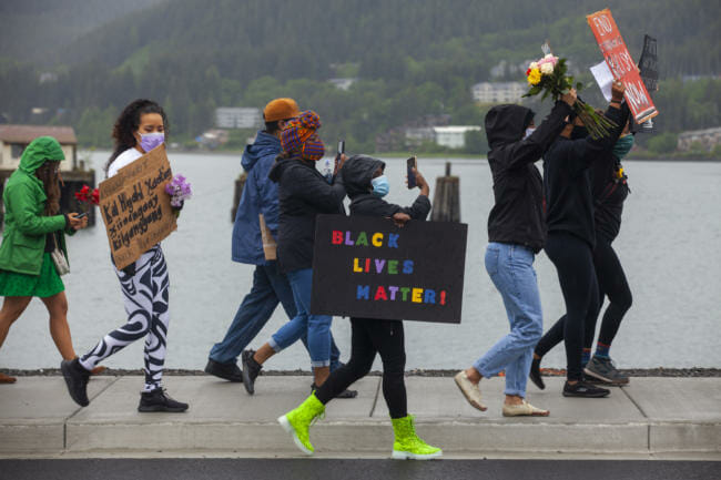 As they marched, a steady parade of cars honked in solidarity with the protestors.
