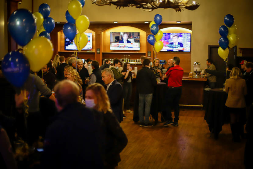 Supporters of Republican U.S. Sen. Dan Sullivan gather for an election night party at 49th State Brewing in Anchorage, Nov. 3, 2020. Republicans did well in the first day of vote counting, which concluded on Wednesday. But more than 133,000 more ballots will be counted next week. (Photo by Jeff Chen/Alaska Public Media)