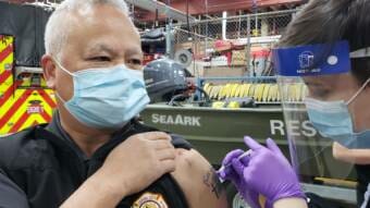Asst Chief Ed Quinto and Lily Kincaid COVID vaccination