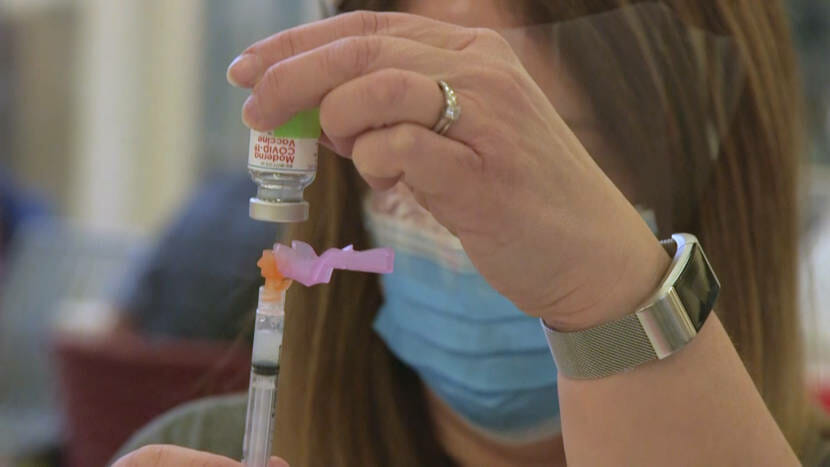 A nurse fills a needle with the COVID-19 Vaccine in Anchorage, AK on Jan. 7, 2021.