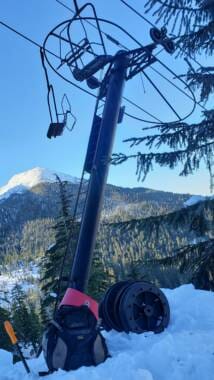 Damaged Ptarmigan chairlift pole on Insane
